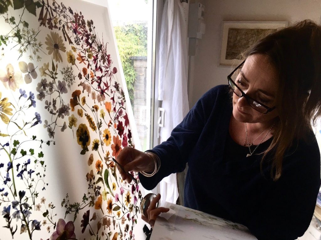 Amy Shelton creating a floral piece for the exhibition 'Biophilia'