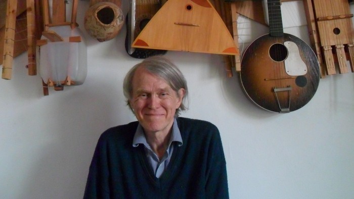 Image of Ian Summers with some of his musical instruments.