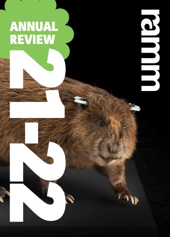 The cover of the annual review, showing the taxidermy beaver on a black background, with '21-22' in large white text