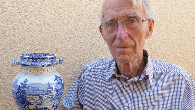 A photo of the collector holding a jug