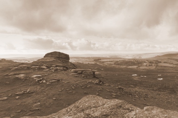 Murder mystery event at RAMM. Atmospheric and moody photo of a tor on the moors.